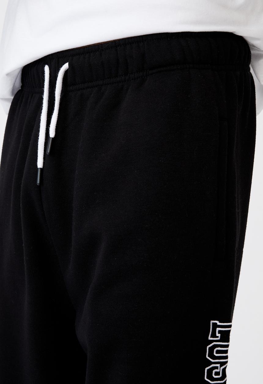 Factorie - Relaxed graphic trackpant - black