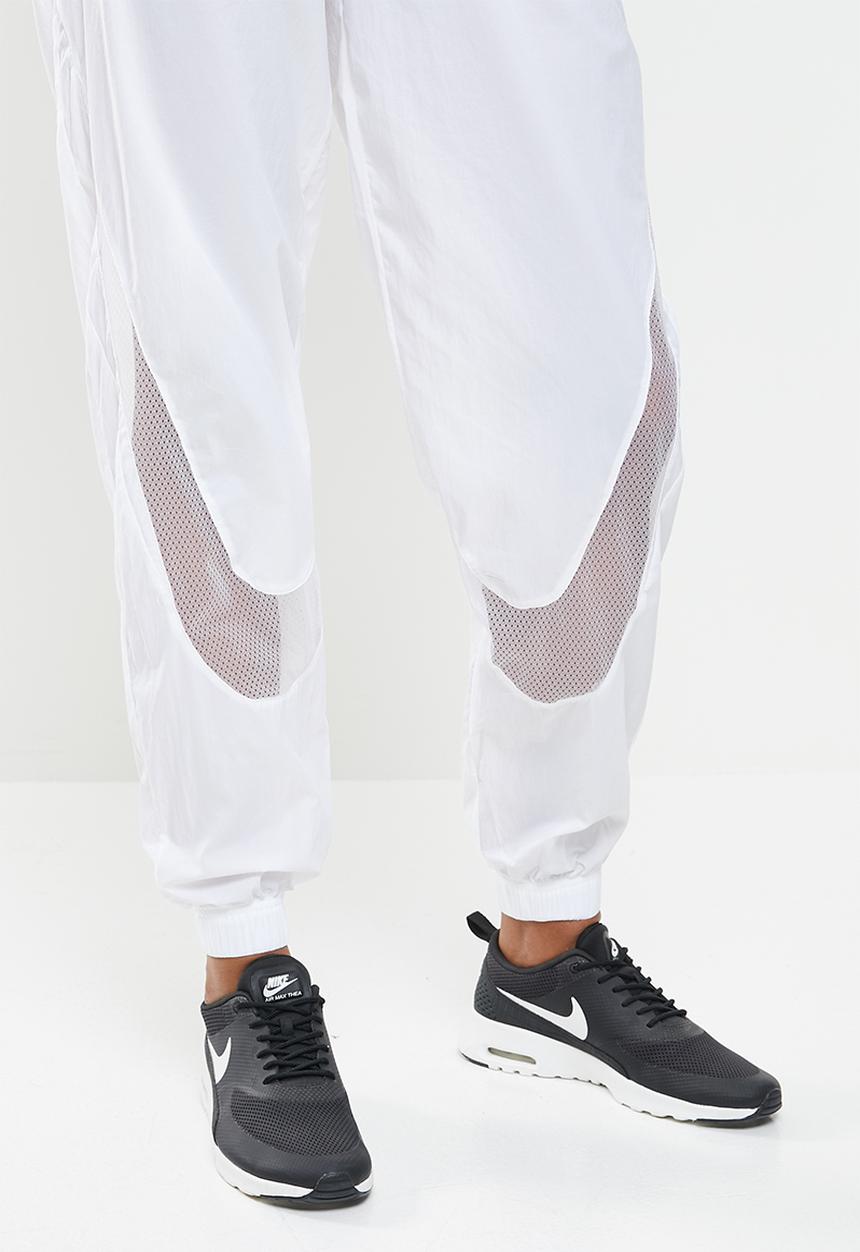 Nike - Nsw amd woven pants - white 