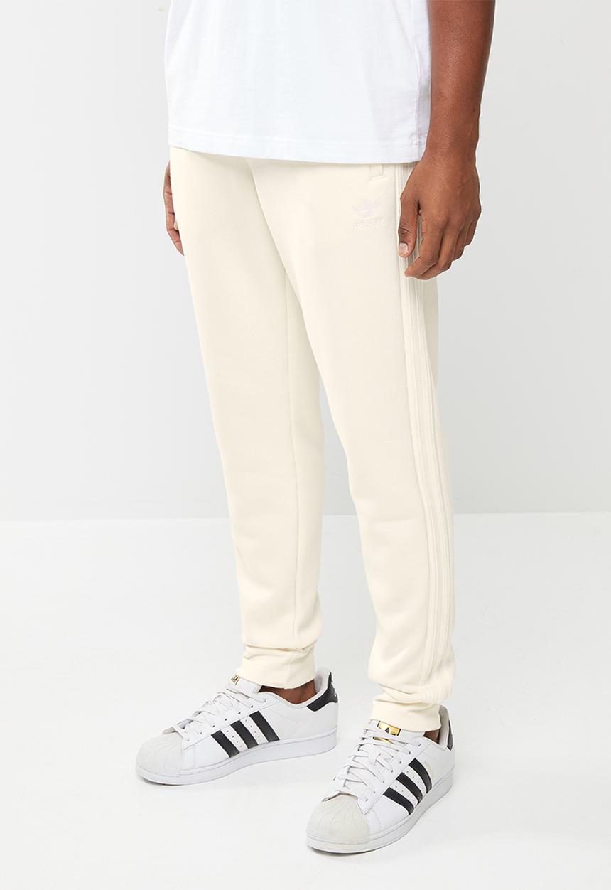 adidas Originals - ADICOLOR 3-STRIPES NO-DYE PANTS Neutral 