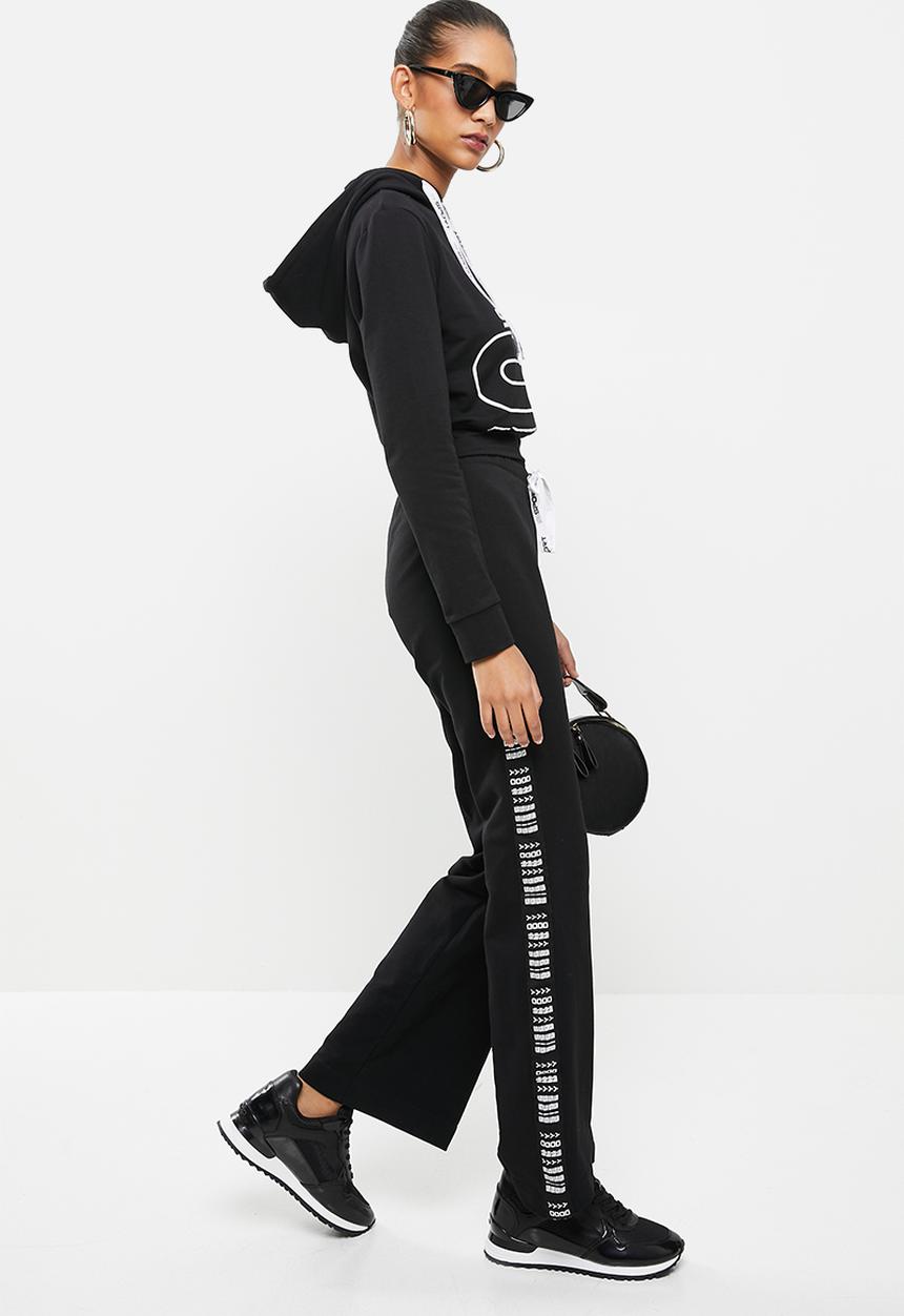 SISSY BOY - Flared sweatpants - black