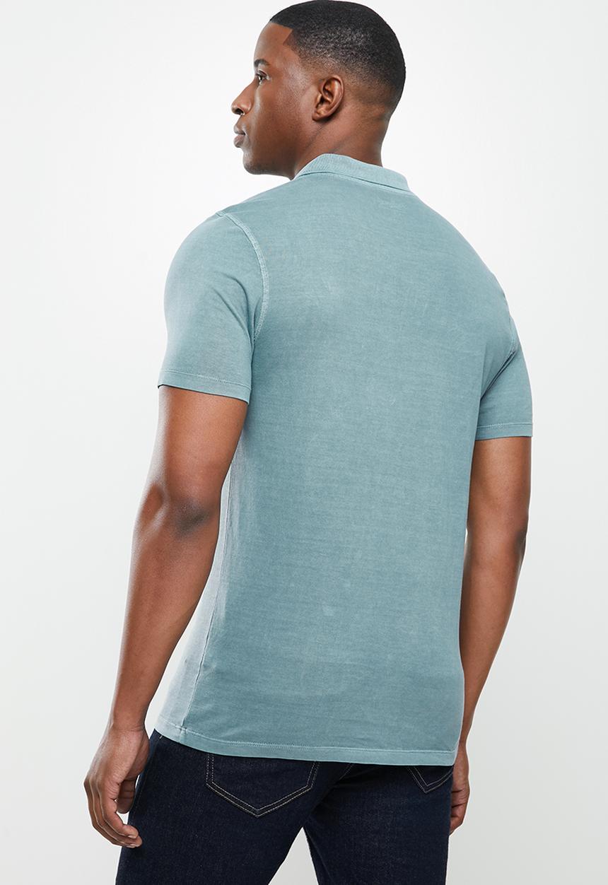 POLO - Thomas overdyed short sleeve golfer - blue