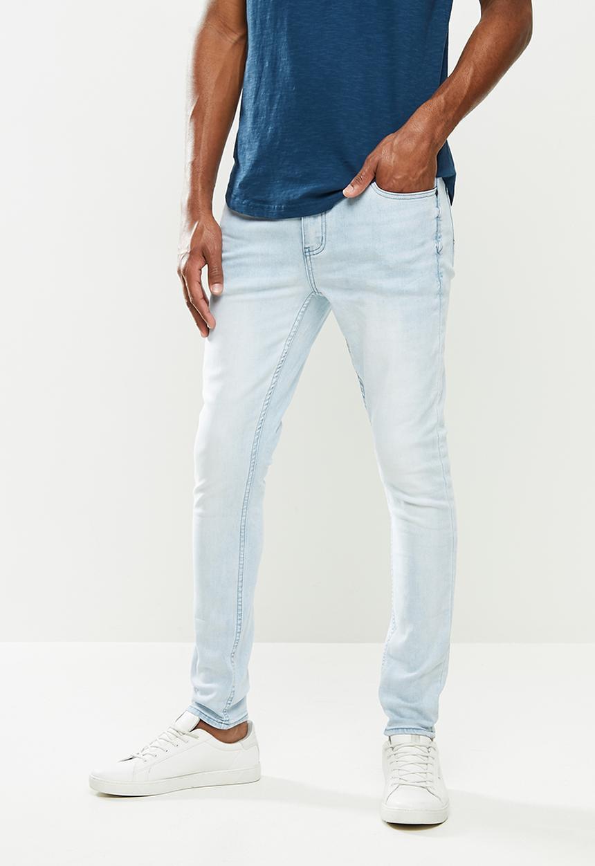 S.P.C.C - Ice Blue Jeans Signature Trench Fit Jeans - Bleach