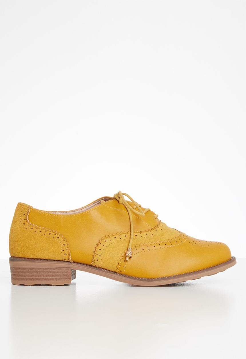Seduction - Paneled detail brogue - mustard