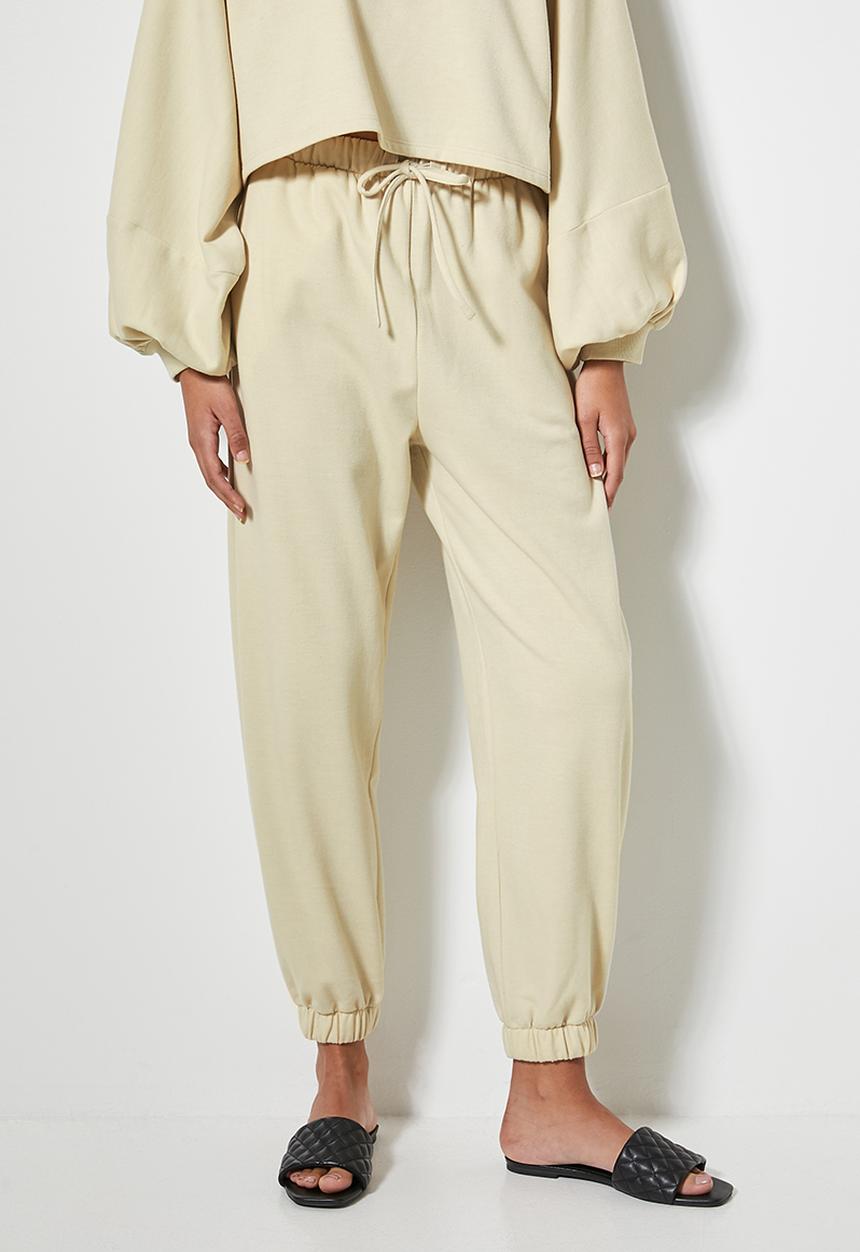 VELVET - Slouch fleece tapered leg track pant - cream