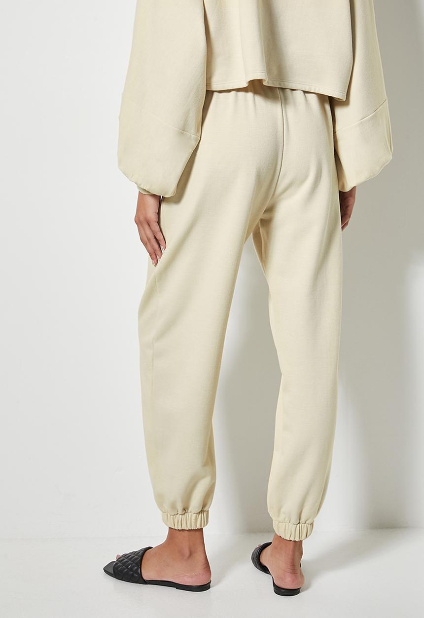 VELVET - Slouch fleece tapered leg track pant - cream