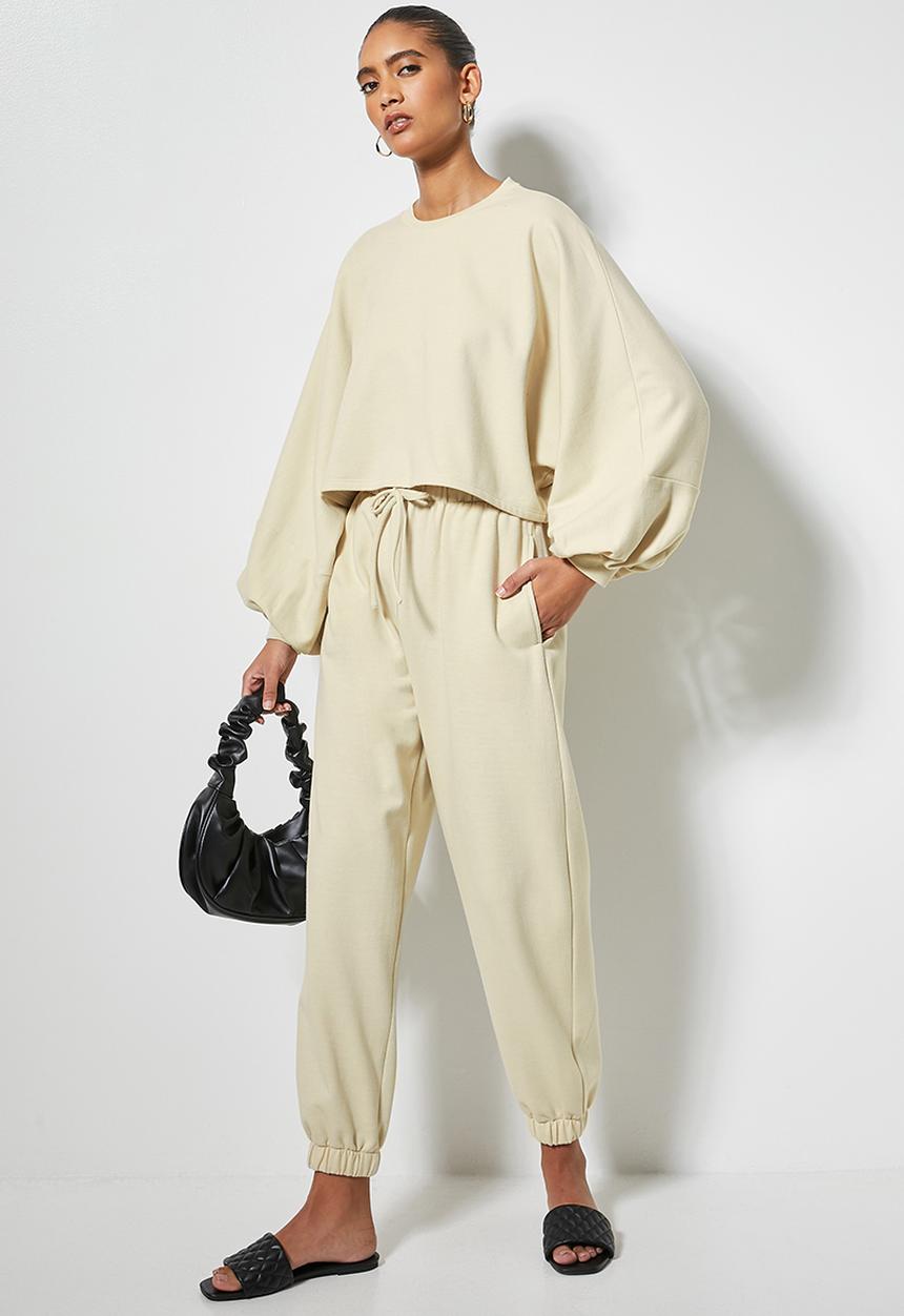 VELVET - Slouch fleece tapered leg track pant - cream
