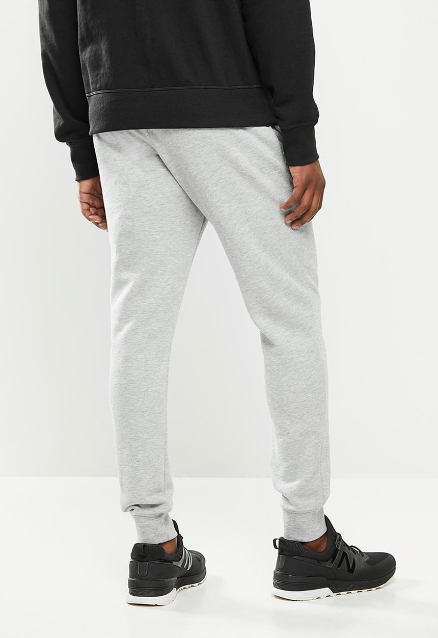 New Balance  - New Balance classics core pant - grey 