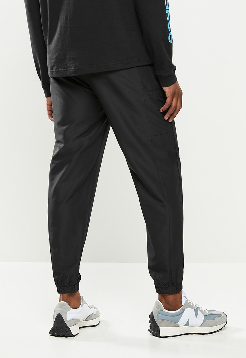 New Balance  - New Balance classics fashion woven pant - black