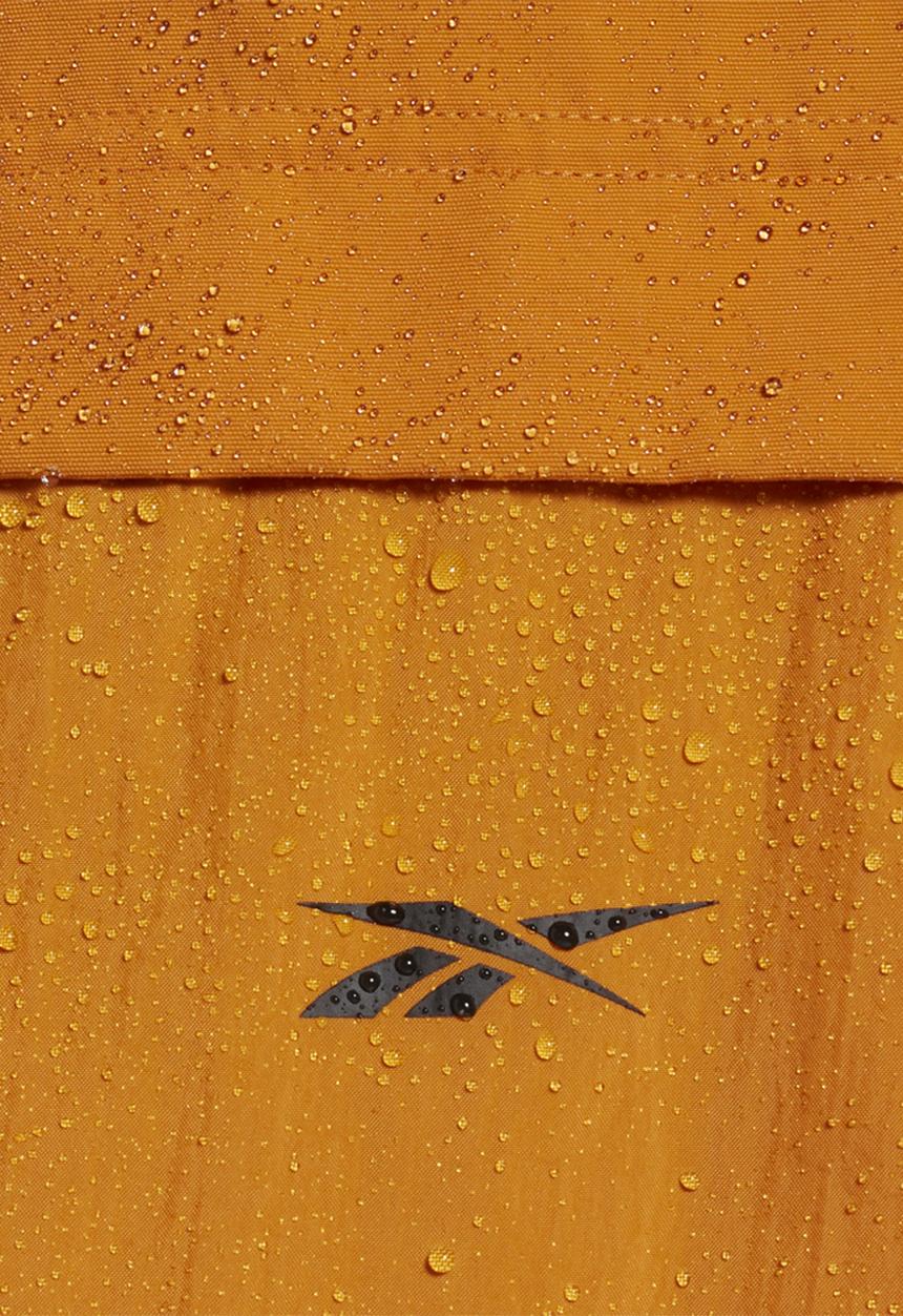 Reebok - Ts road trip vest jackets - radiant ochre