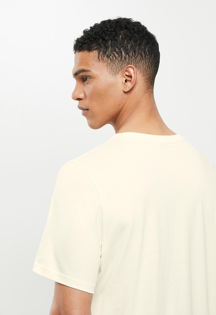 PUMA - Graphic tee key moments - eggnog