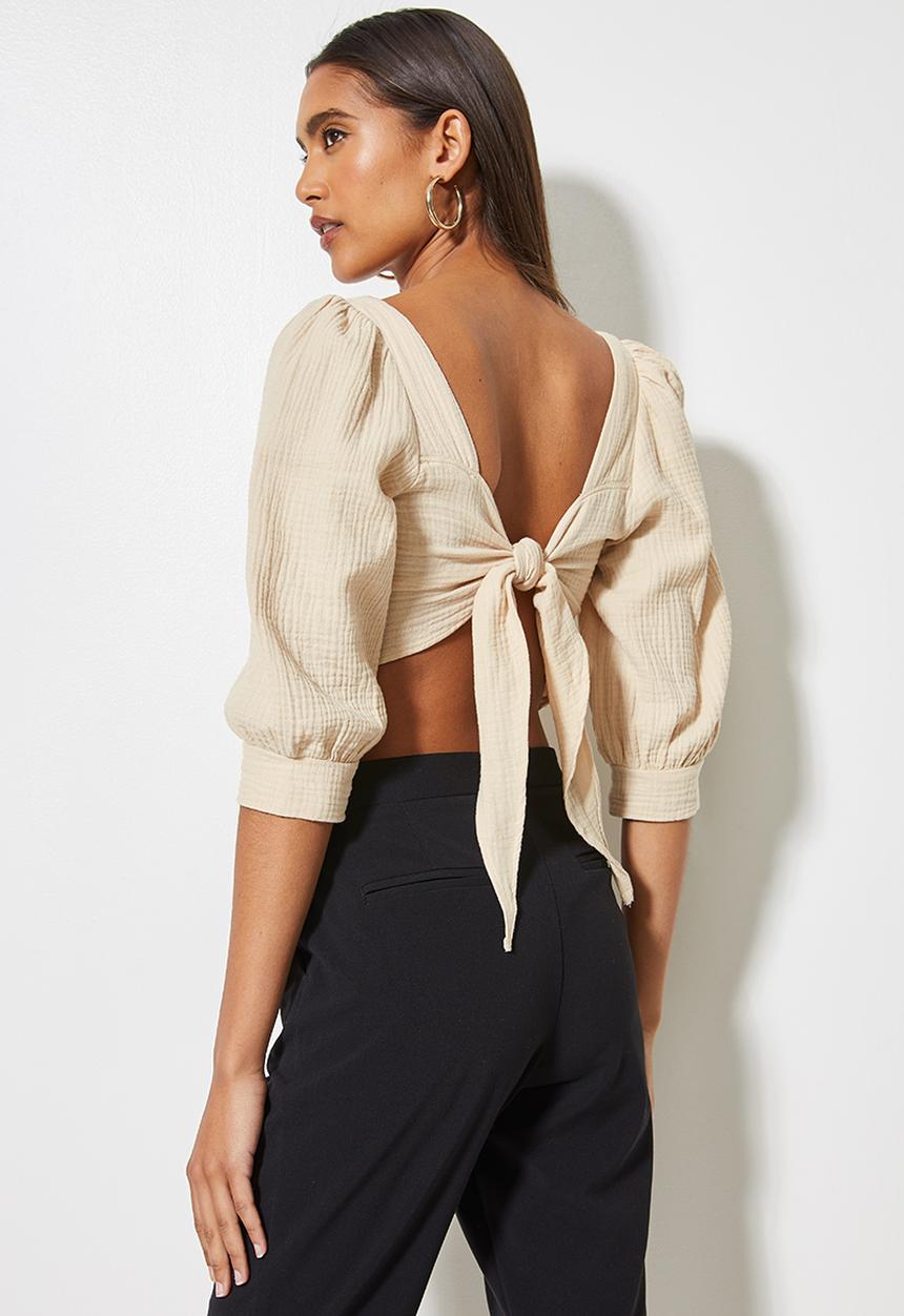 VELVET - Textured cross over front puff sleeve crop with tie back - stone