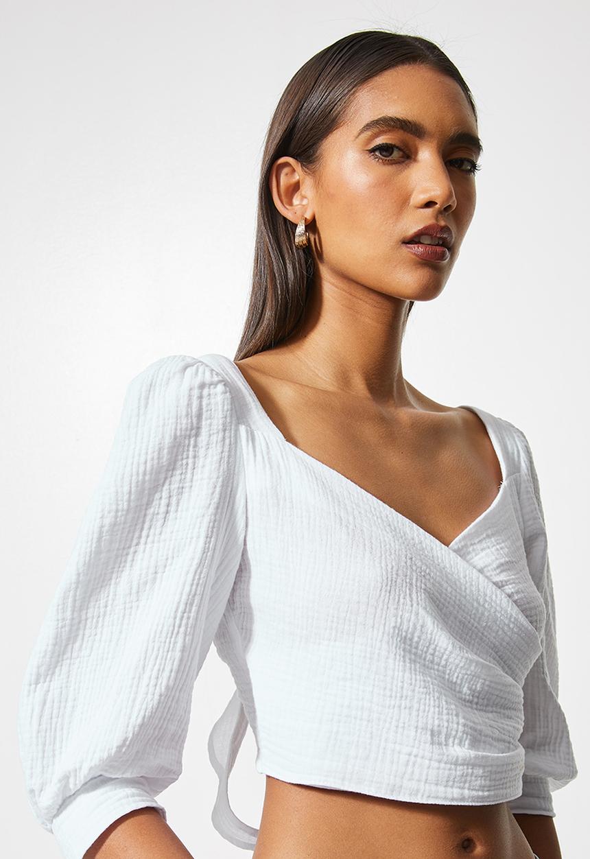 VELVET - Textured cross over front puff sleeve crop with tie back - white