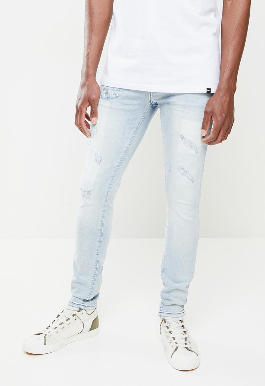 S.P.C.C - Mondrian sabre fit tapered leg jeans - blue