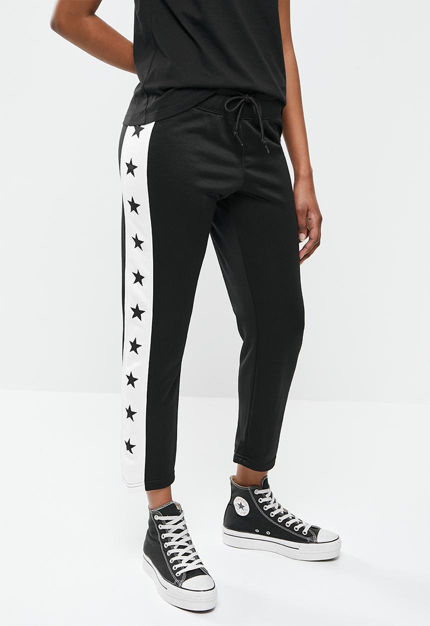 Converse - Star print tapered pant black multi