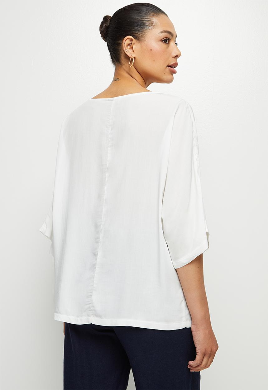 edit - Oversized boxy shell - milk