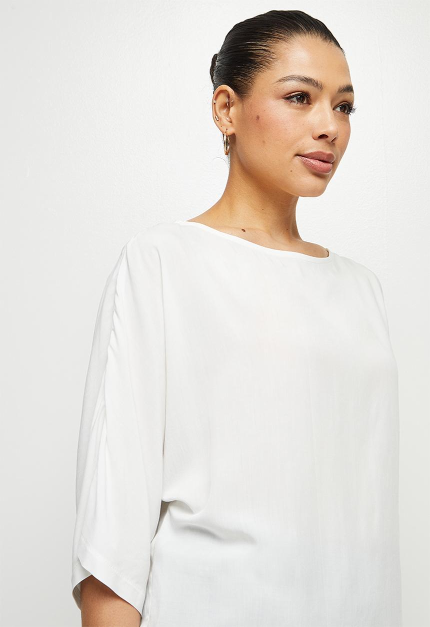 edit - Oversized boxy shell - milk