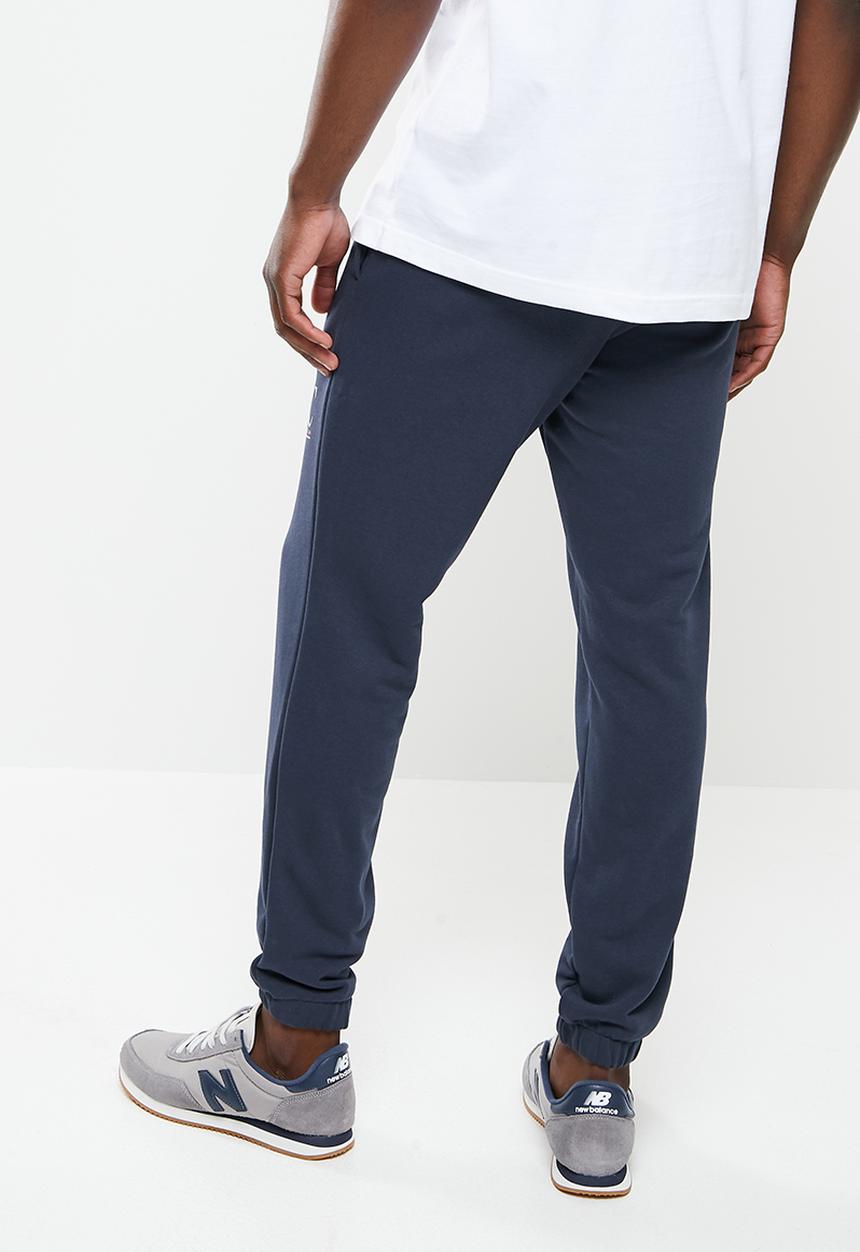 New Balance  - Nb essentials athletic club fleece pant - eclipse