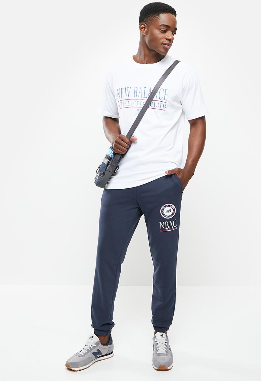 New Balance  - Nb essentials athletic club fleece pant - eclipse