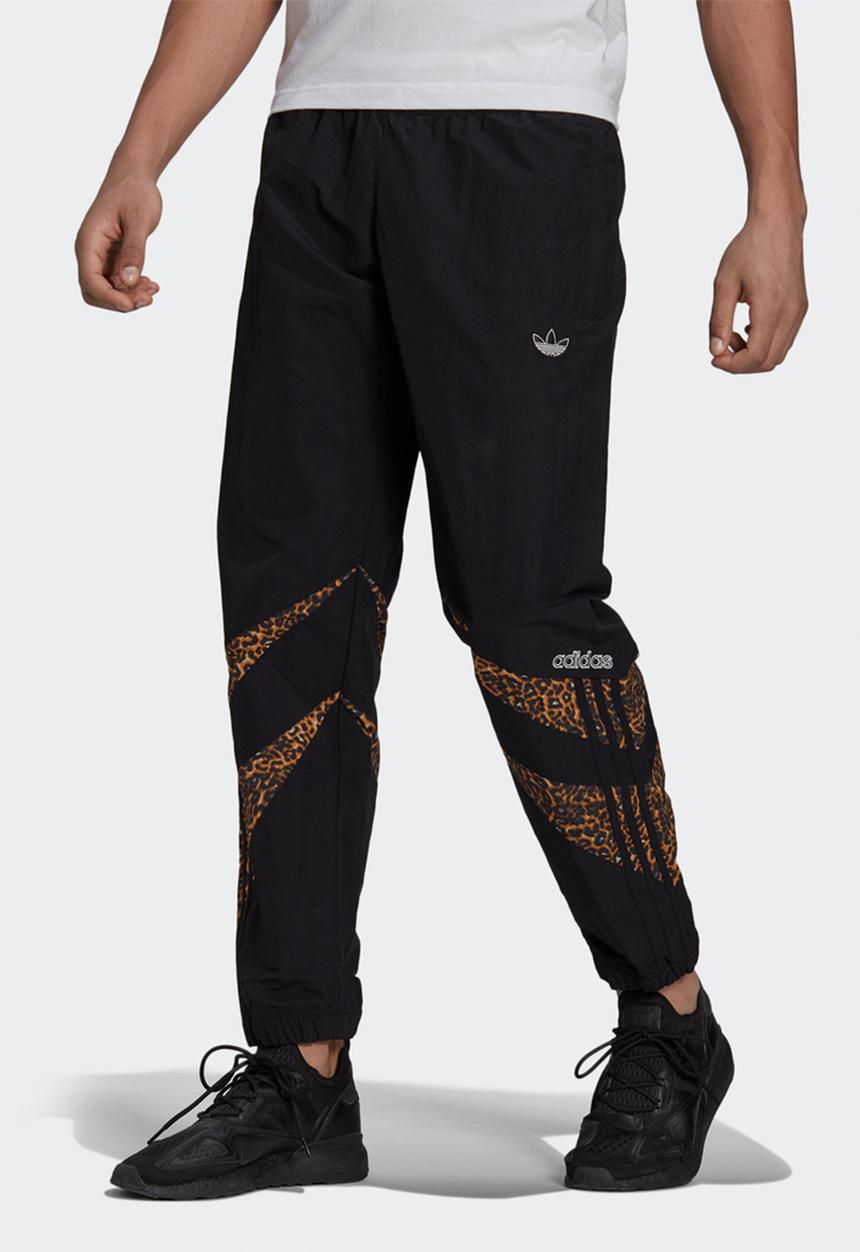 adidas Originals - ADIDAS SPRT ANIMAL PRINT SHARK WOVEN TRACK PANTS    - black & brown 