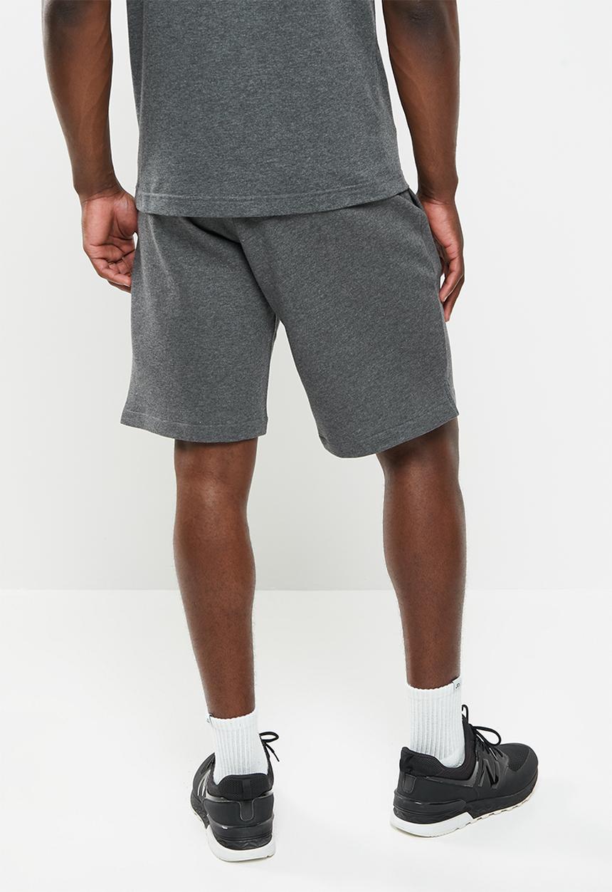 New Balance  - Nb classics core fleece short - heather charcoal