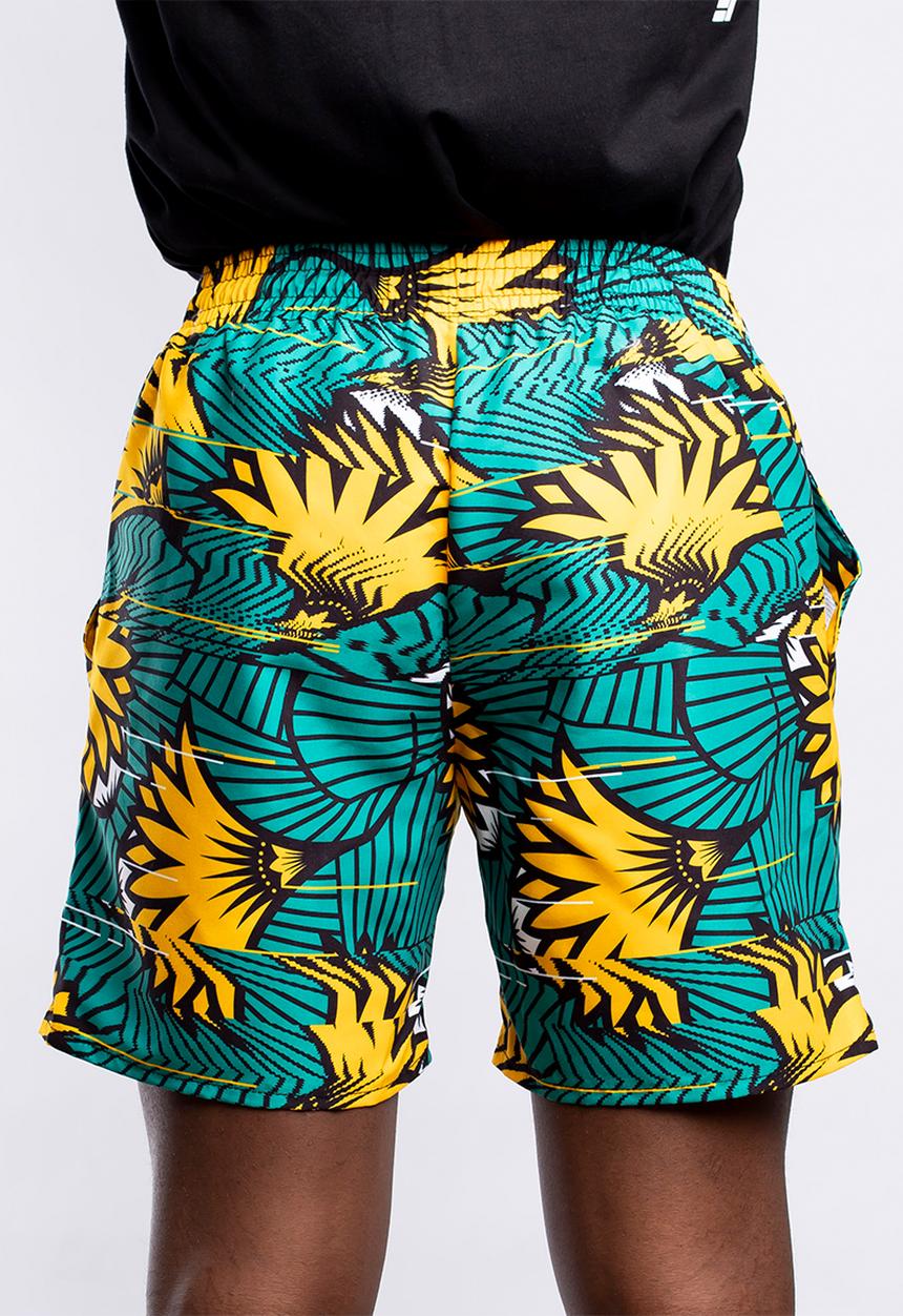 Butan - Protea wax football shorts - green & yellow