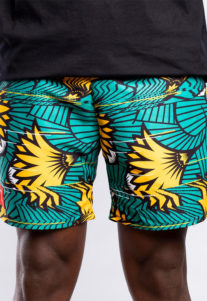 Butan - Protea wax football shorts - green & yellow