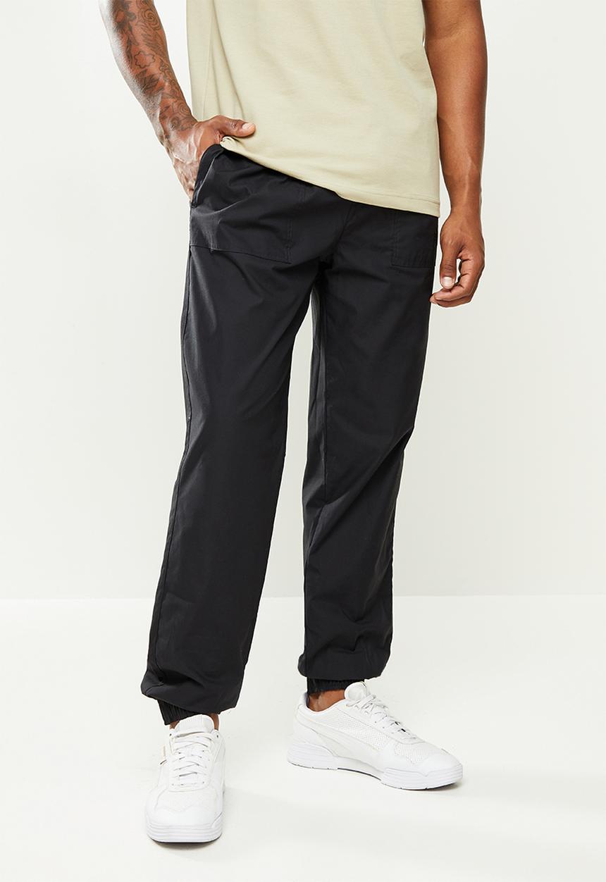PUMA - Modern basics chino pants - black