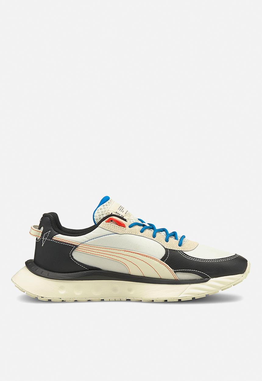 PUMA - Wild rider re.gen - puma black-ivory glow