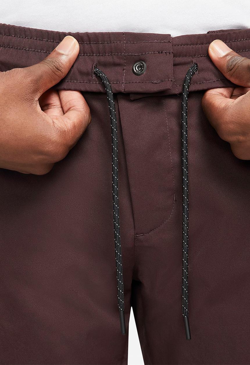 Nike -  Tech Essentials Men's Unlined Commuter Trousers - brown basalt/black