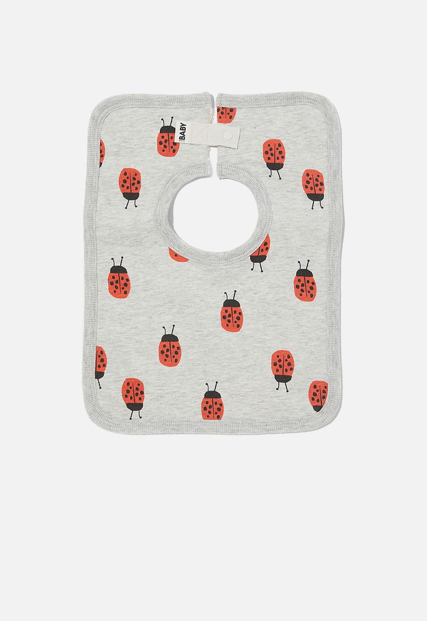 Cotton On - The square bib - cloud marle/red orange lily ladybug