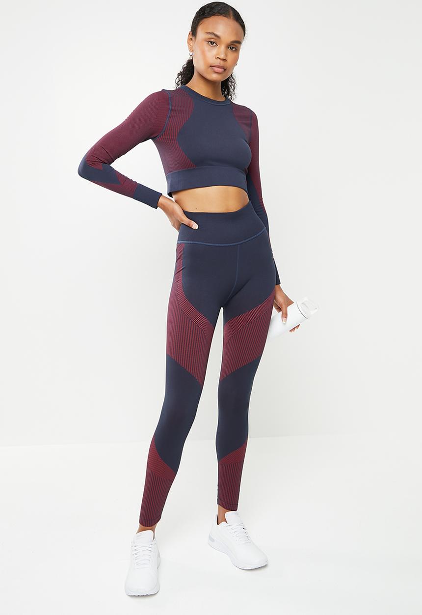 PUMA - Train seamless high waisted 7/8 tights - sunblaze