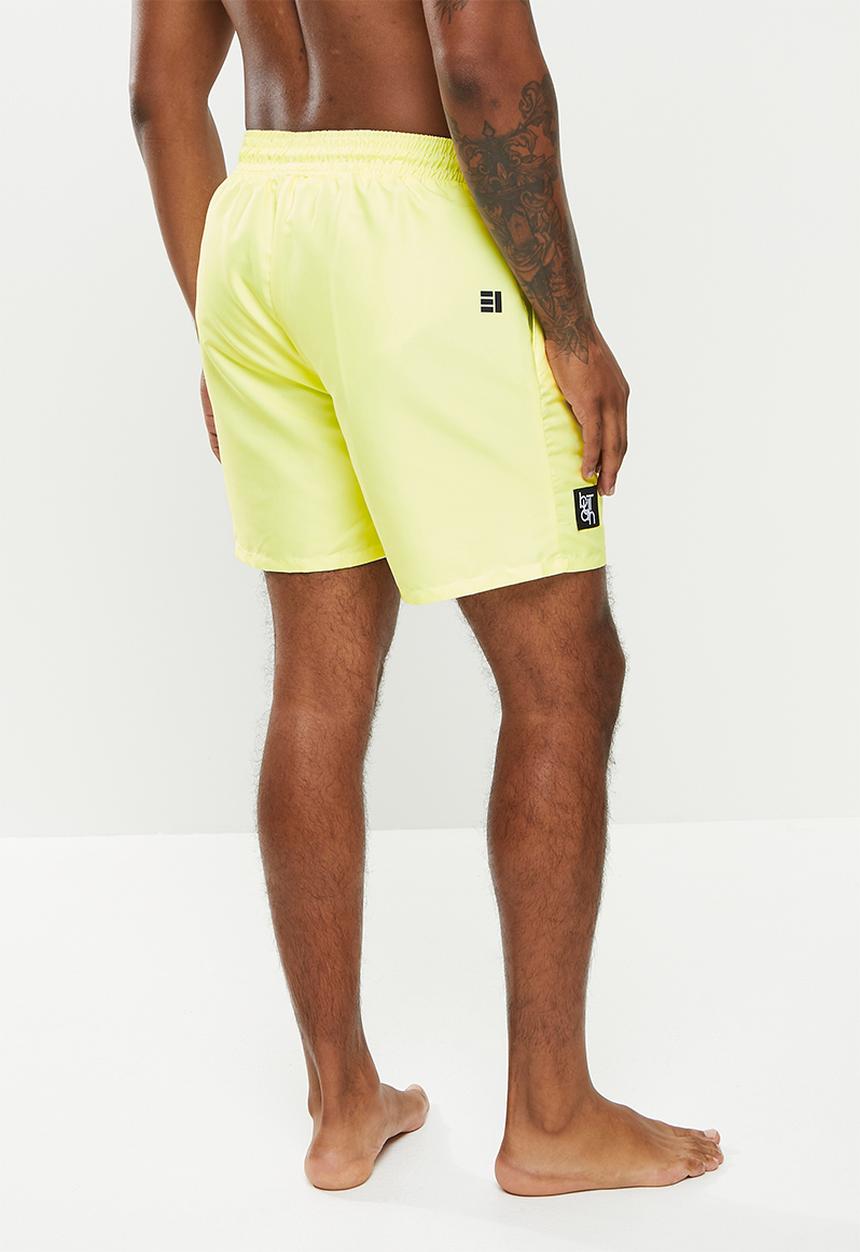 Butan - Aluta block letters shorts - pastel yellow