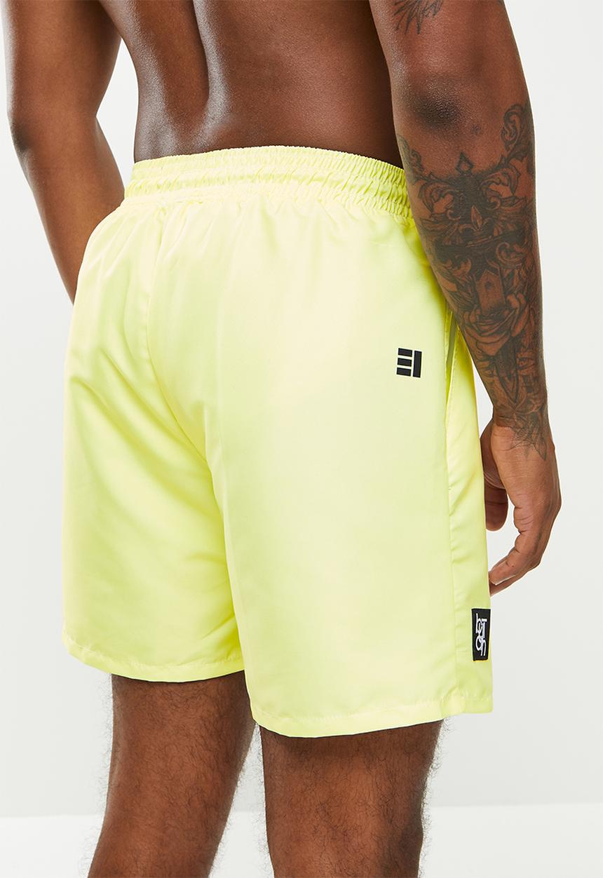Butan - Aluta block letters shorts - pastel yellow