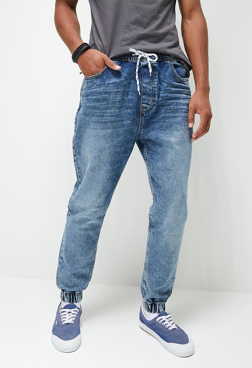 STYLE REPUBLIC - Gabe tapered fit cuff jeans - washed mid blue