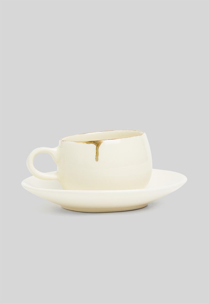 Urchin Art - Set of two cirilla cup & saucer- cream & gold