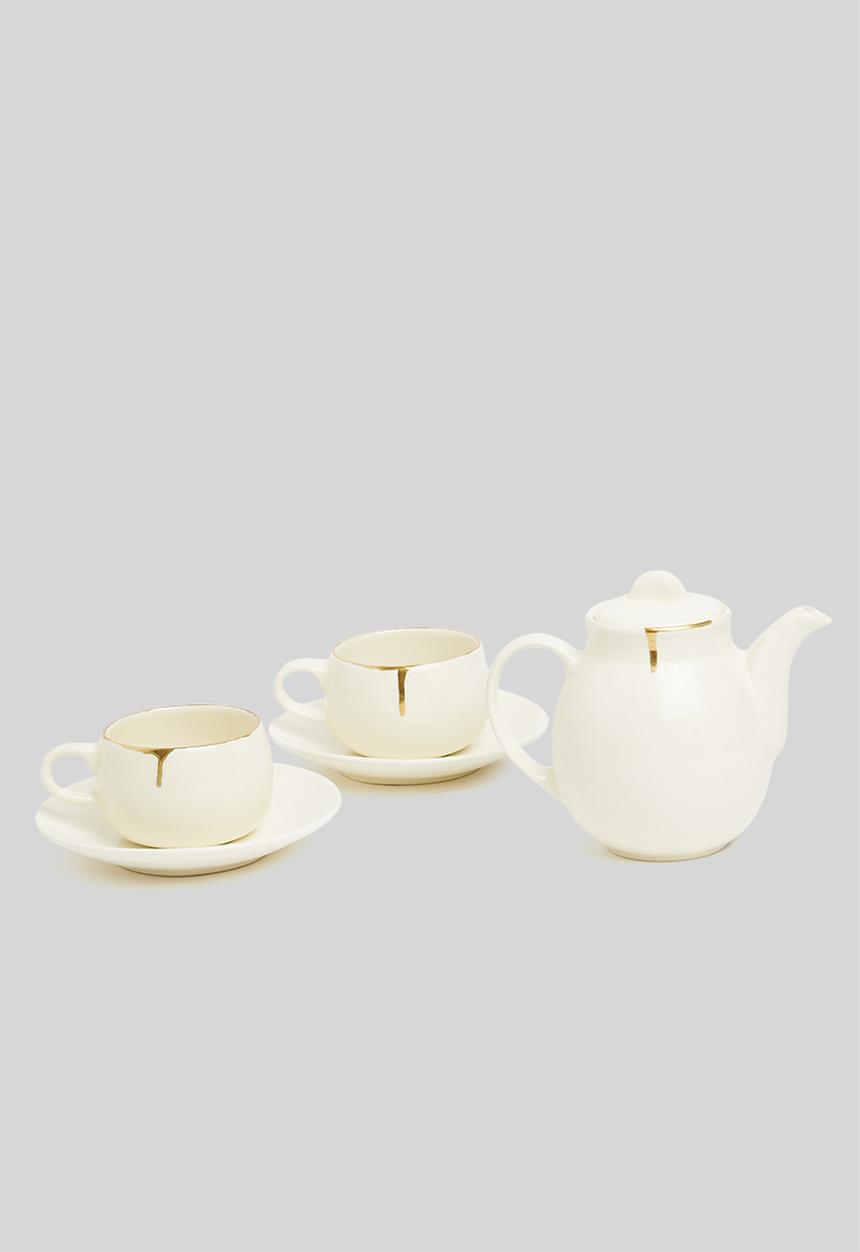 Urchin Art - Set of two cirilla cup & saucer- cream & gold