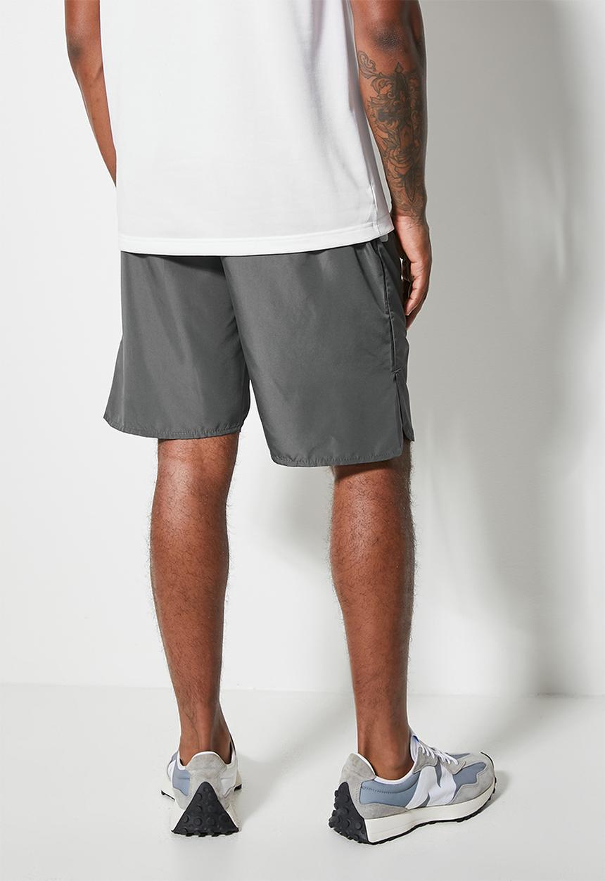 Superbalist - Knee length gym shorts - dark grey