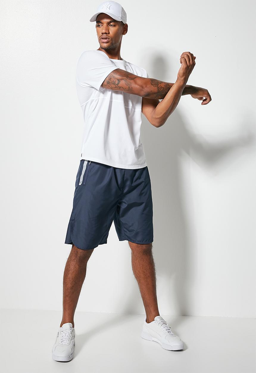 Superbalist - Knee length gym shorts - navy