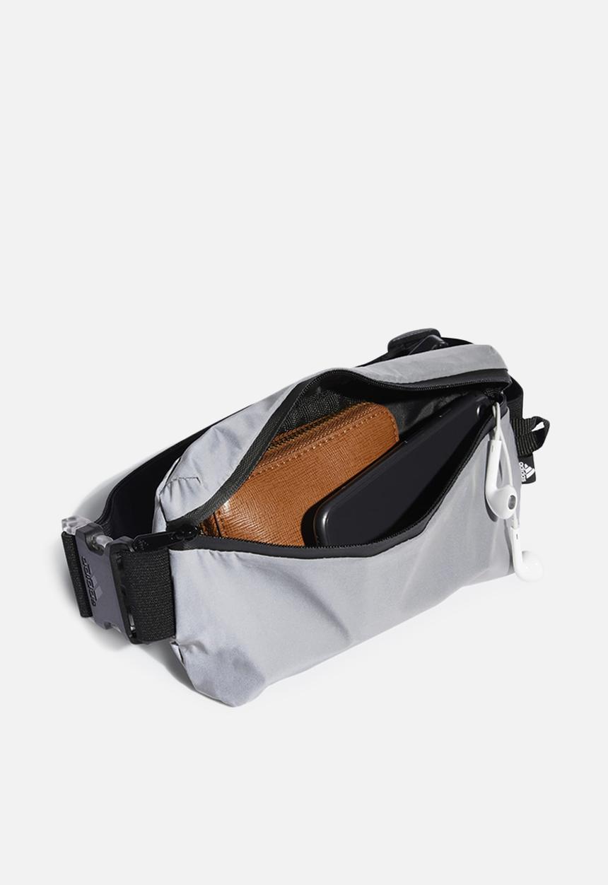 adidas Performance - Sports waistbag - reflective/black