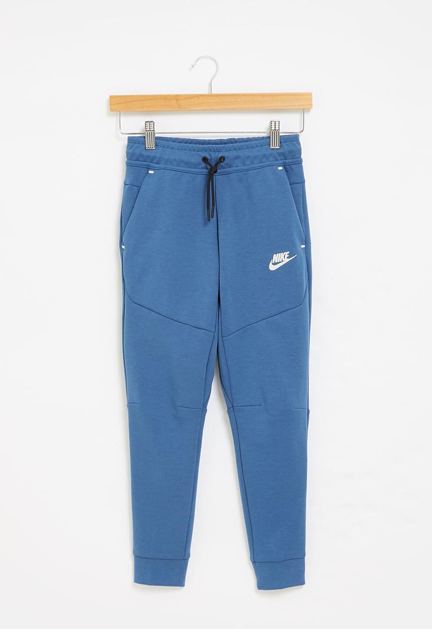 Nike - B nsw tch flc pant - dk marina blue & light bone