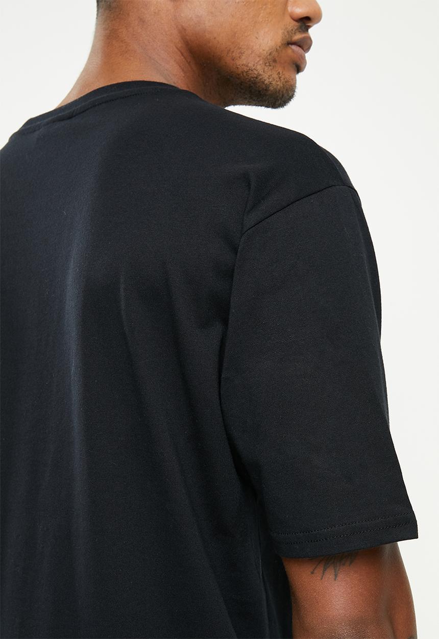 New Balance  - NB Athletics Amplified Logo Tee - Black
