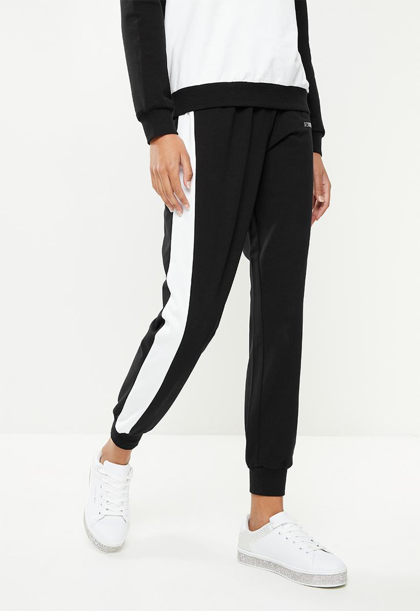 SISSY BOY - Trackpants with bling logo - black & white