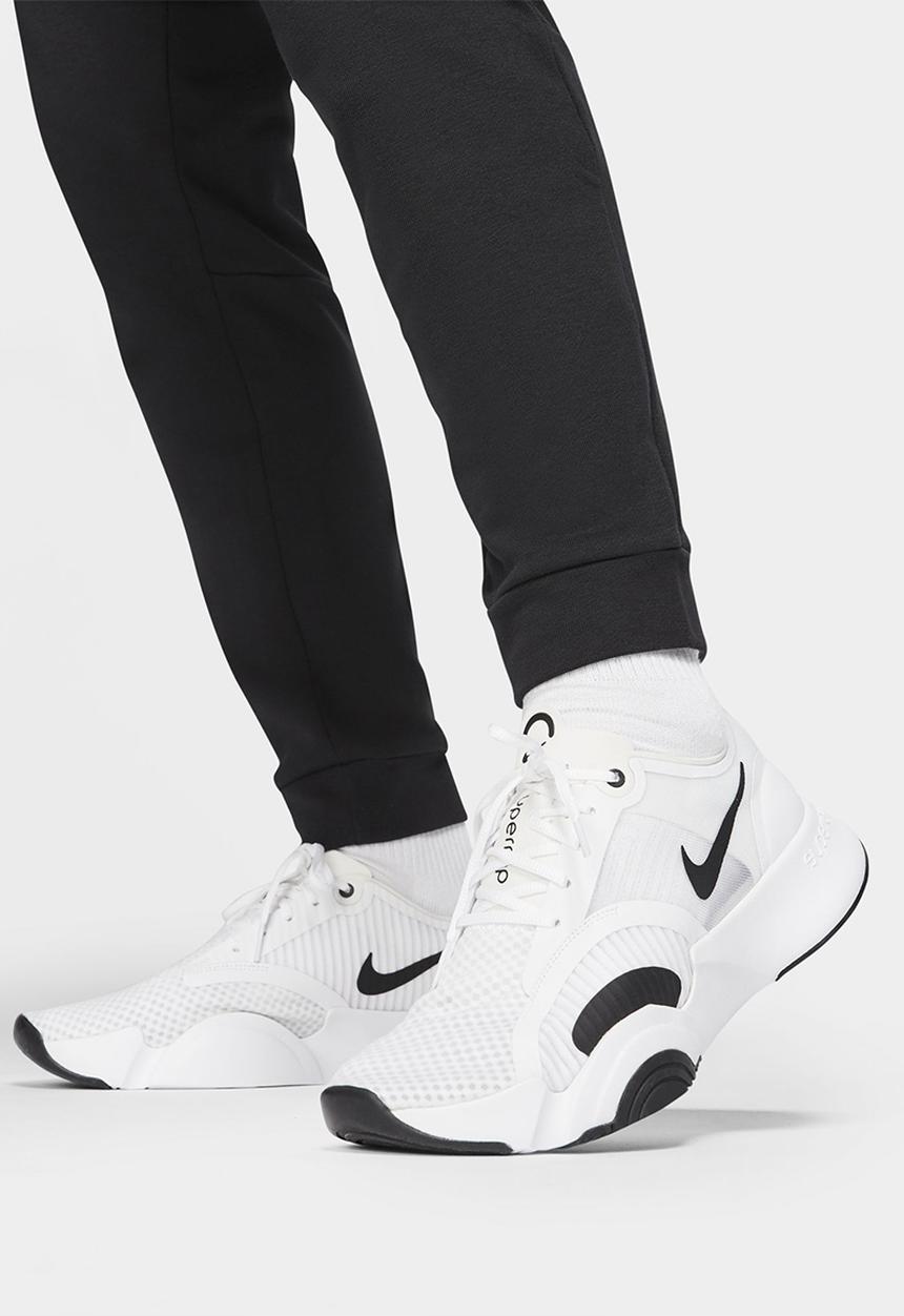 Nike - Dri-FIT Men's Tapered Training Trousers - Black & White