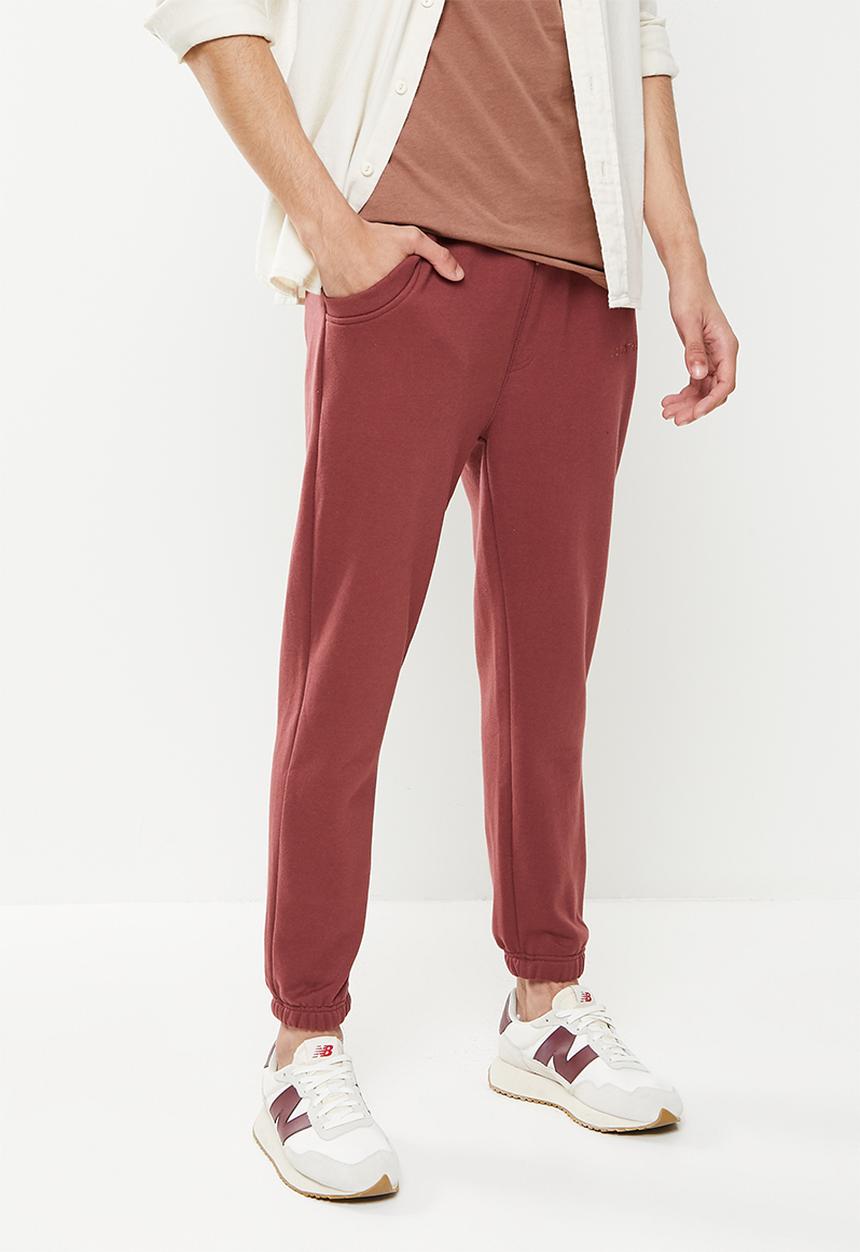 Jonathan D - Men's branded sweat pants - red