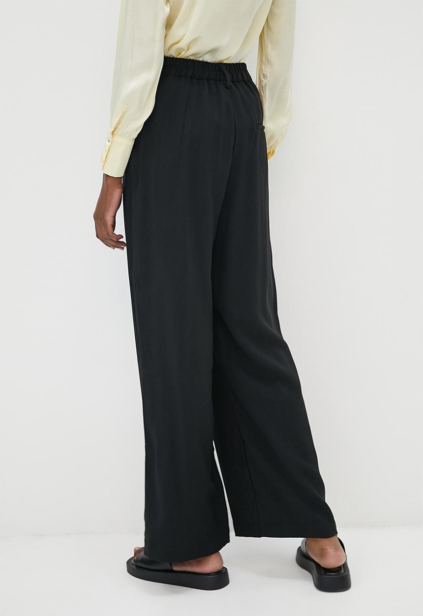 Superbalist - Wide leg trousers  - black
