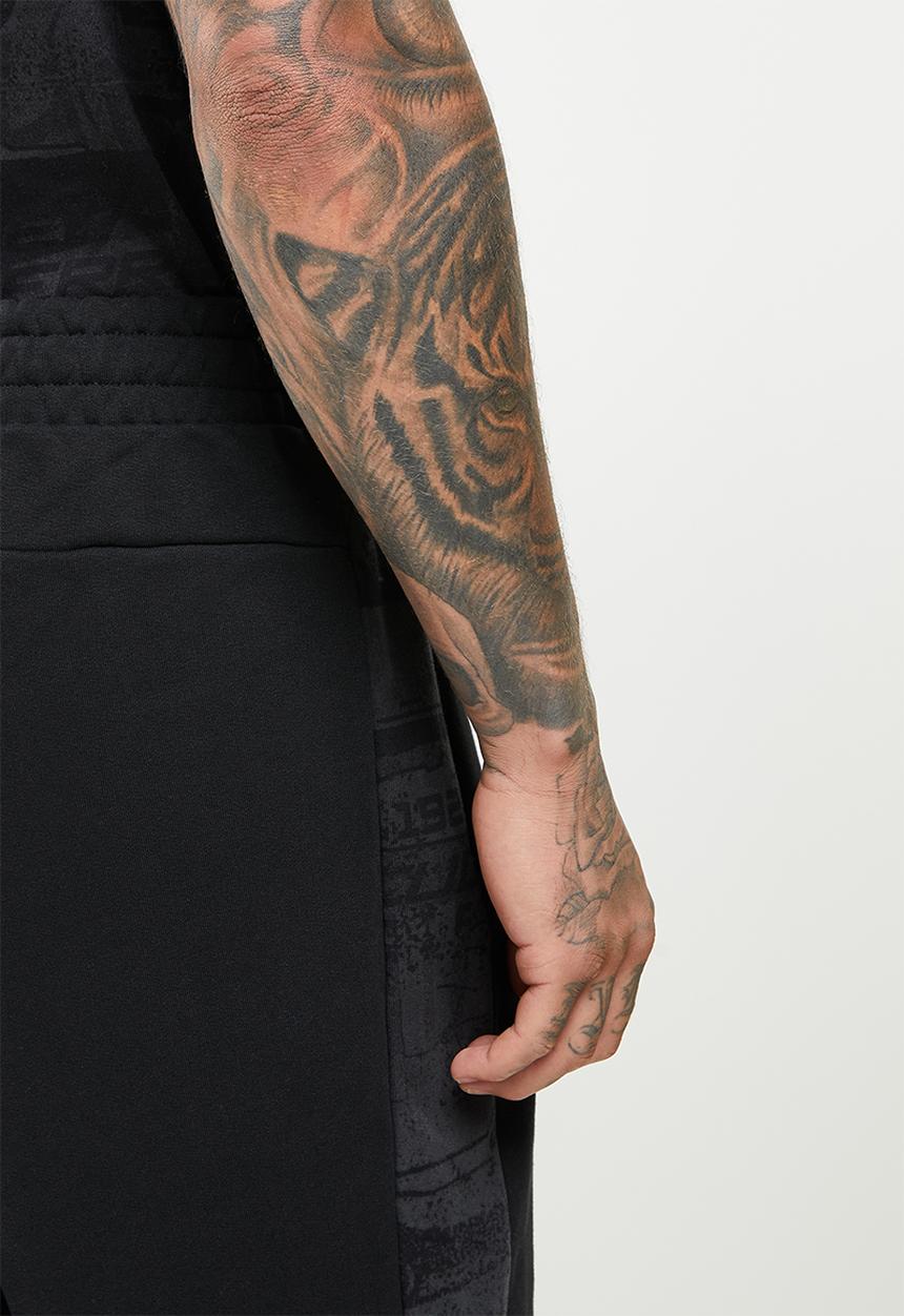 PUMA - Ferrari race aop sweat pants - puma black