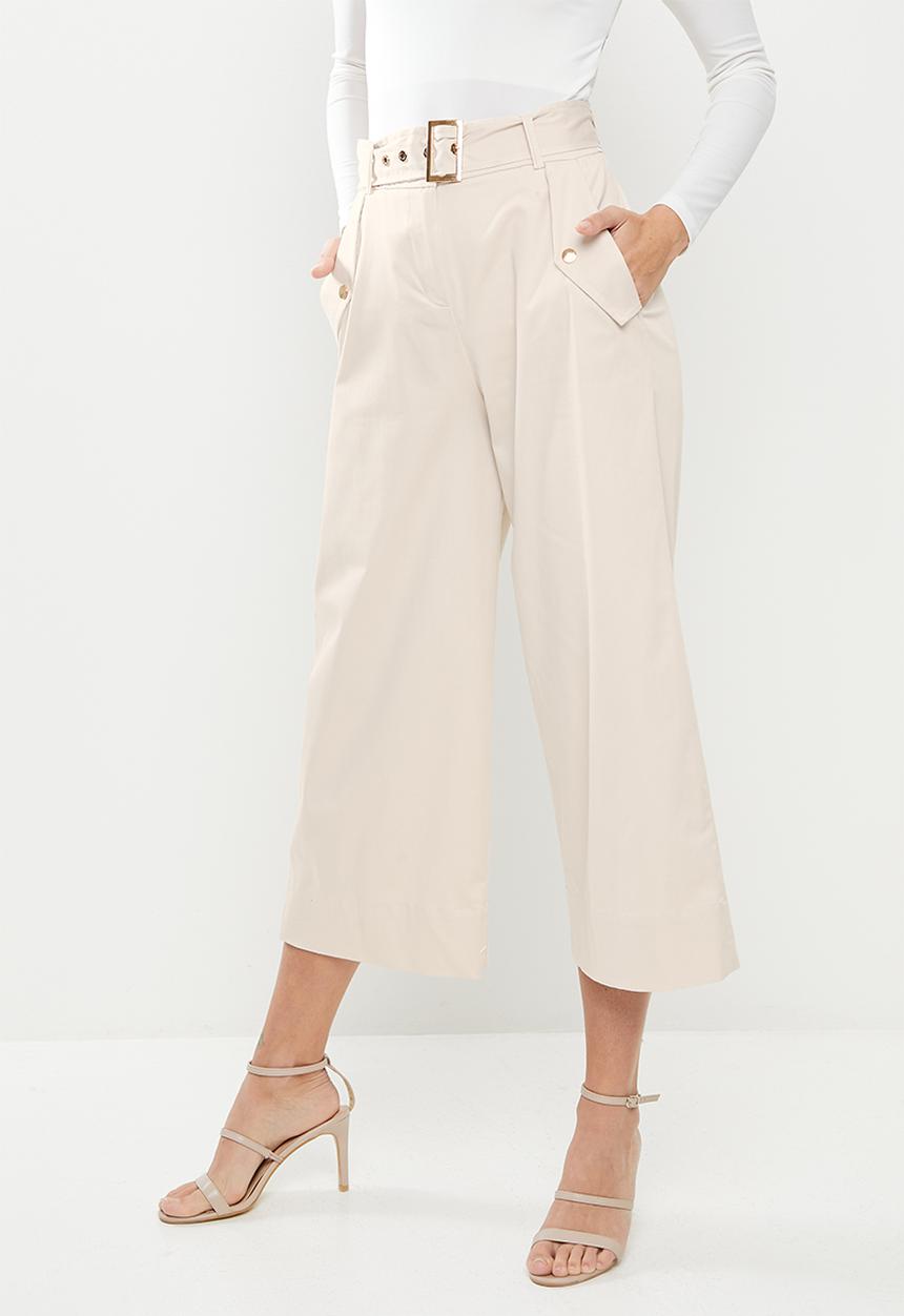 Koton - Medium rise pocket detailed belted trousers - beige