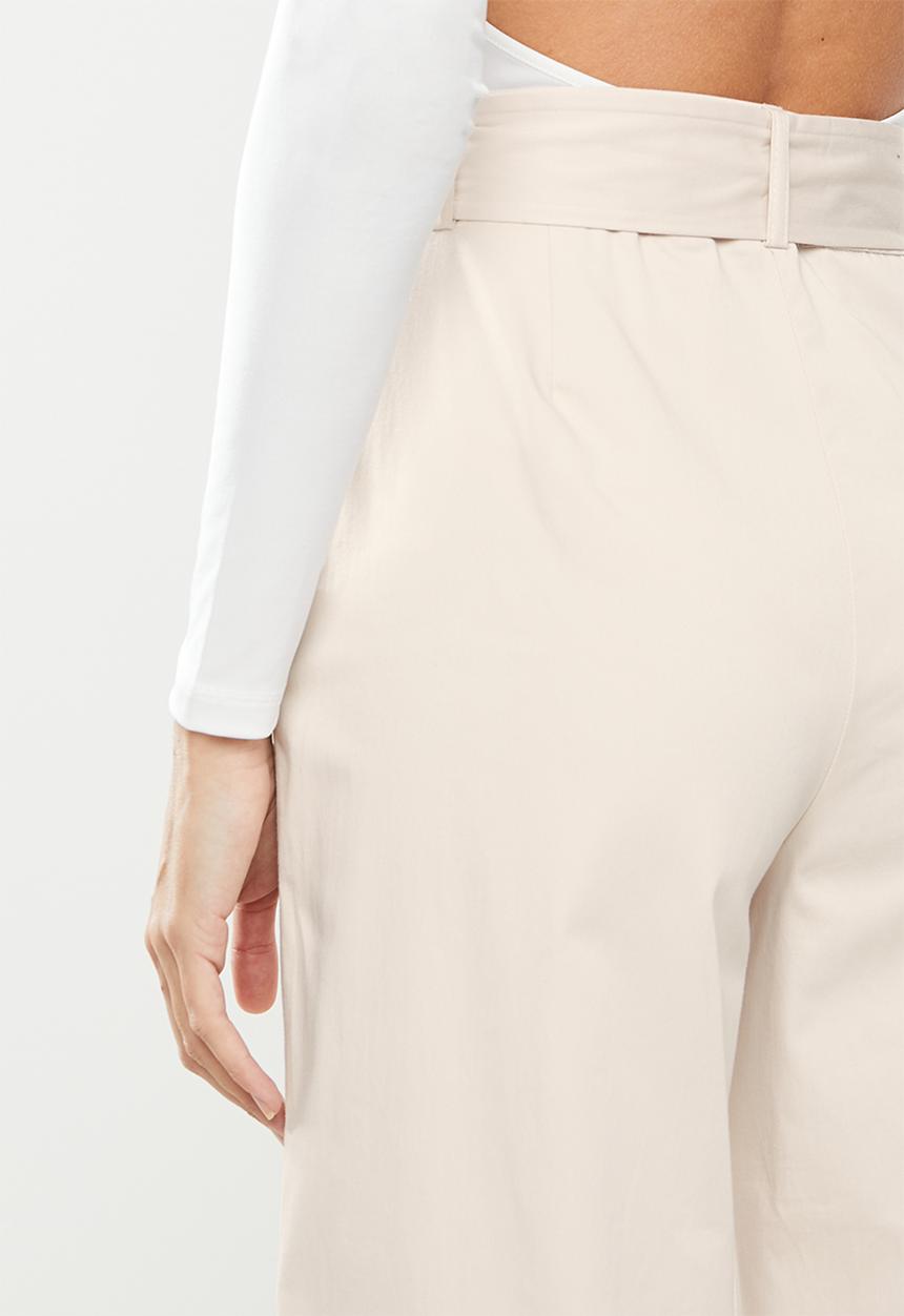 Koton - Medium rise pocket detailed belted trousers - beige