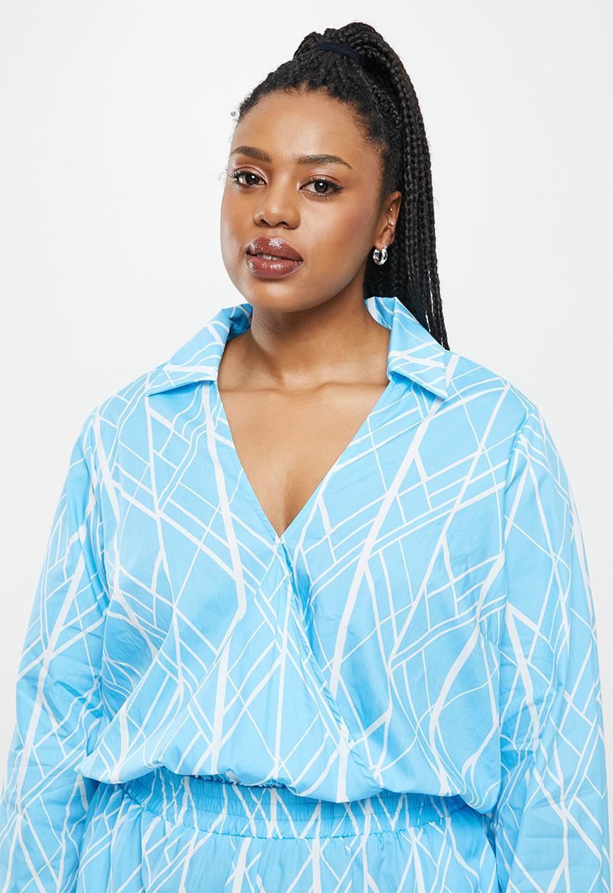 Glamorous - Plus abstract geo print long sleeve playsuit - blue