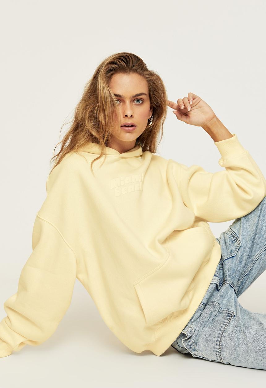 Supré  - Paige oversized printed hoodie - lemon chiffon miami beach